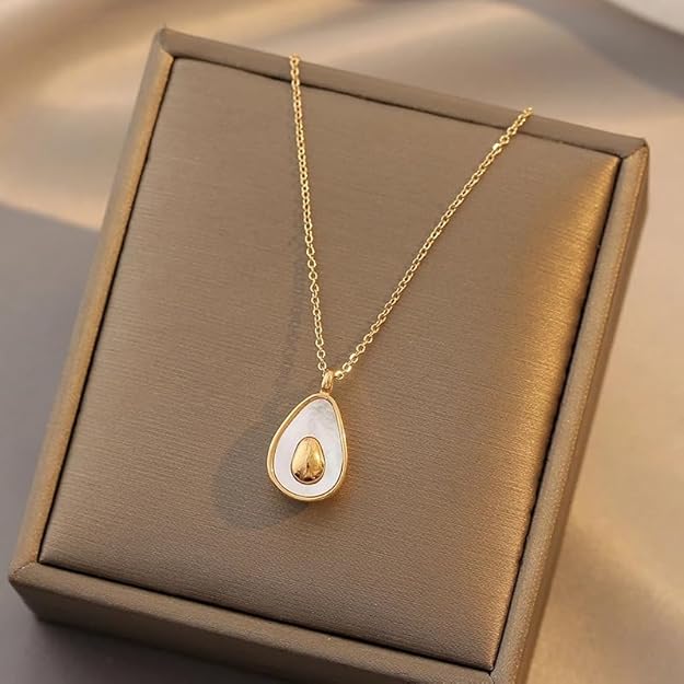 Gold plated tear shaped pendant necklace on a white background.