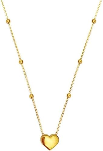 Elegant gold heart necklace on a dainty chain, a timeless piece of jewelry.