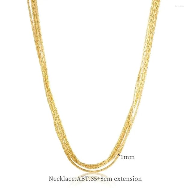 Elegant gold chain necklace presented in a luxurious brown box.