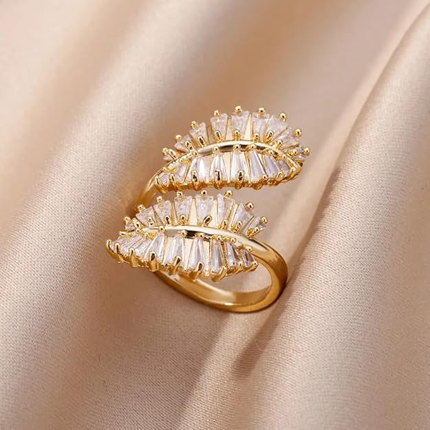 Gold plated ring with intricate leaf design, perfect for nature lovers.