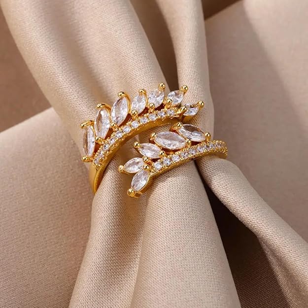 A stunning gold plated ring featuring sparkling white diamonds.