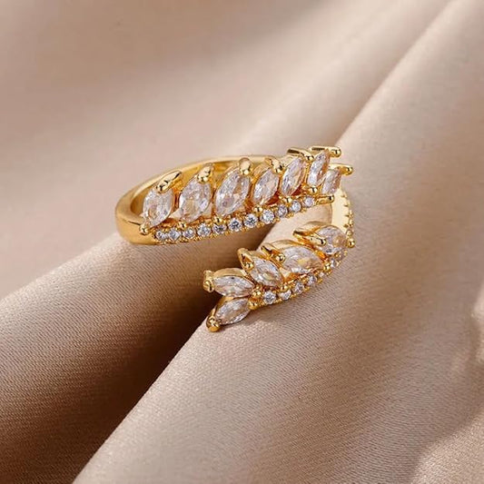 A gold ring with white diamonds.