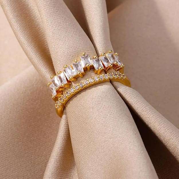 Beautiful gold ring with stunning white stones.