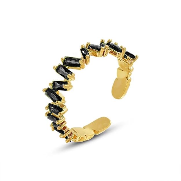 A luxurious gold and black diamond ring, perfect for adding a touch of elegance to any outfit.