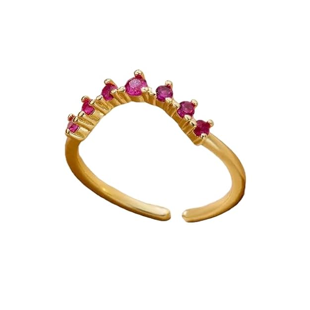 Gorgeous gold ring with sparkling pink stones, a must-have accessory for those who love a touch of glamour.