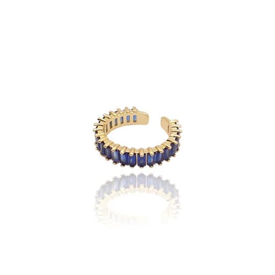 Exquisite blue and gold ring showcasing a precious stone.