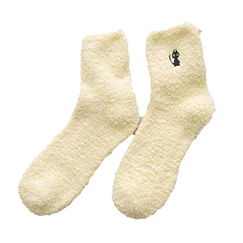 A pair of white socks featuring a stylish black logo, perfect for casual wear or adding flair to your outfit.