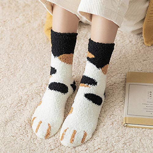 Cute socks featuring playful black and white cat paw prints, perfect for animal lovers and cozy days at home.