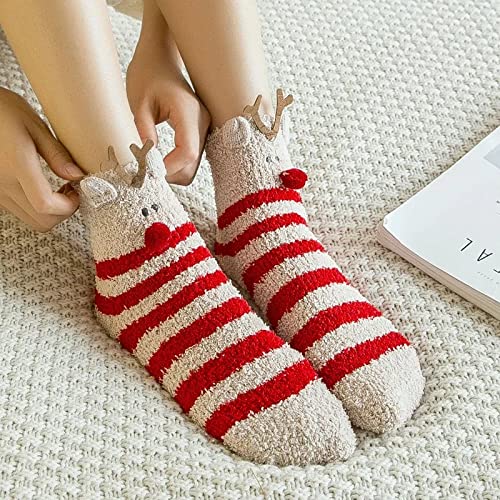 A woman is wearing red and white striped socks, showcasing a playful and vibrant fashion choice.