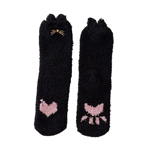 Two black cat socks adorned with pink hearts, showcasing a playful and charming design perfect for cat lovers.
