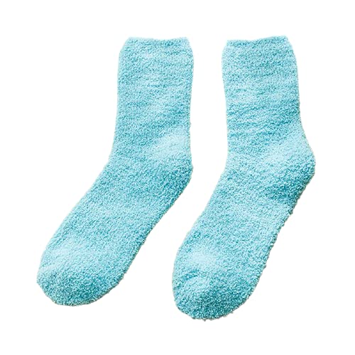 A pair of blue socks neatly placed on a clean white background, showcasing their vibrant color and texture.