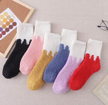 Red and white socks dusted with fluffy white snow, adding a festive touch to your winter wardrobe.