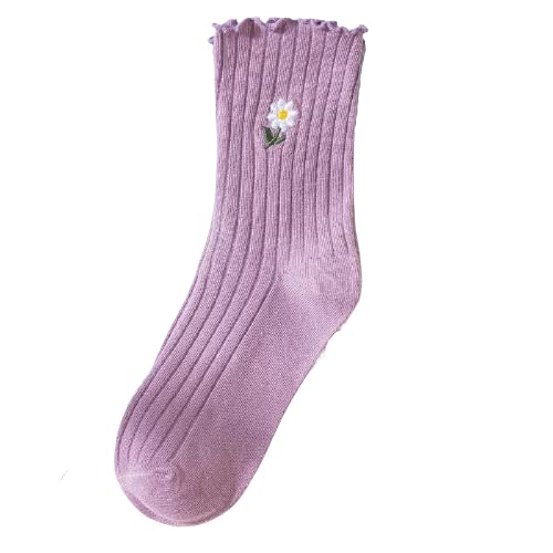 A pair of purple socks adorned with cheerful daisies, showcasing a vibrant and playful design.
