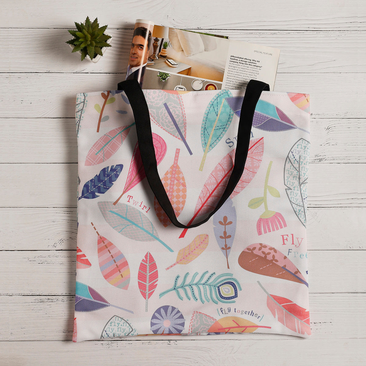  Vibrant tote bag featuring a stylish leaf design, ideal for adding a pop of color to your outfit.