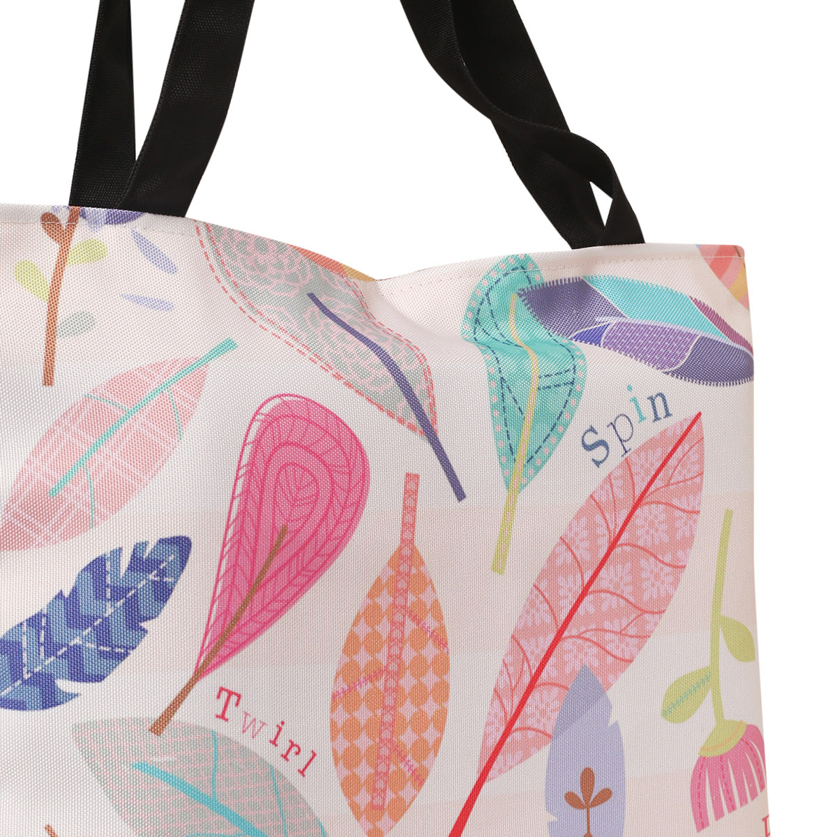 A vibrant tote bag featuring a decorative leaf pattern in various colors, perfect for stylish and eco-friendly use.