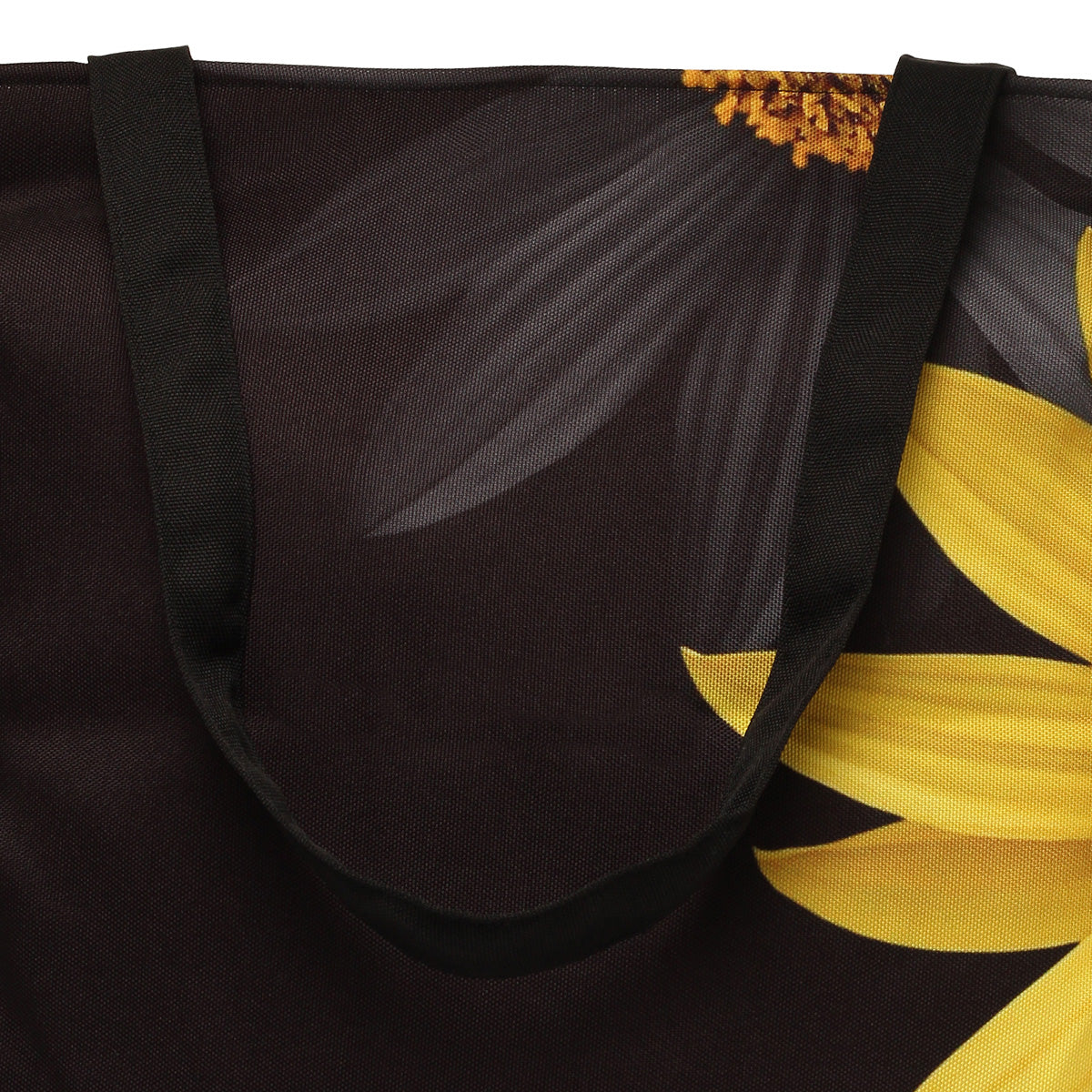 A black and yellow floral tote bag.