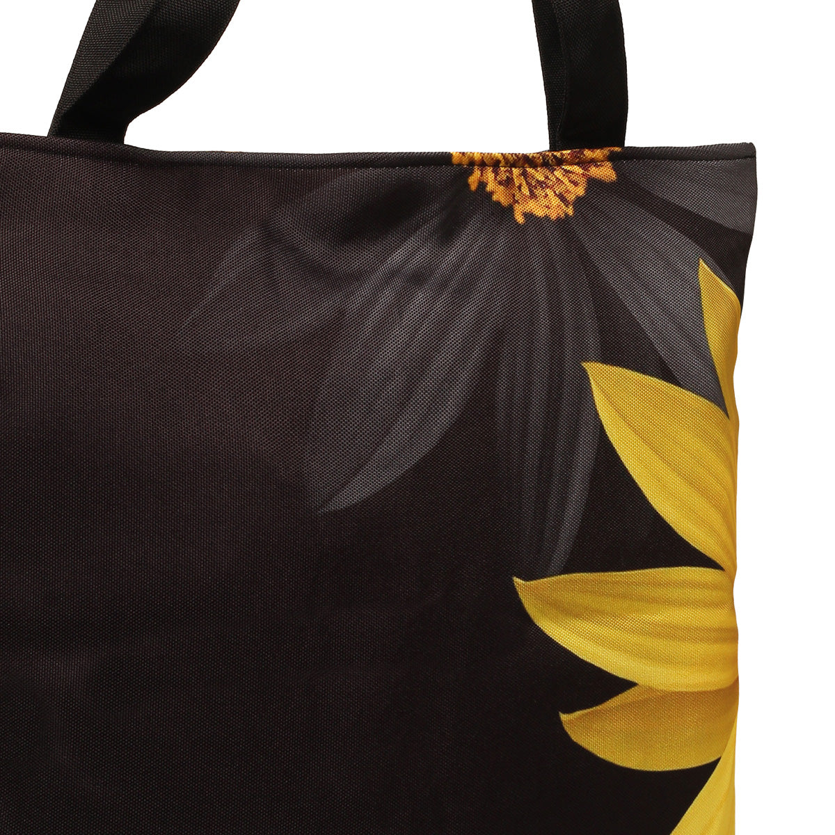 A tote bag with black and yellow flower print.