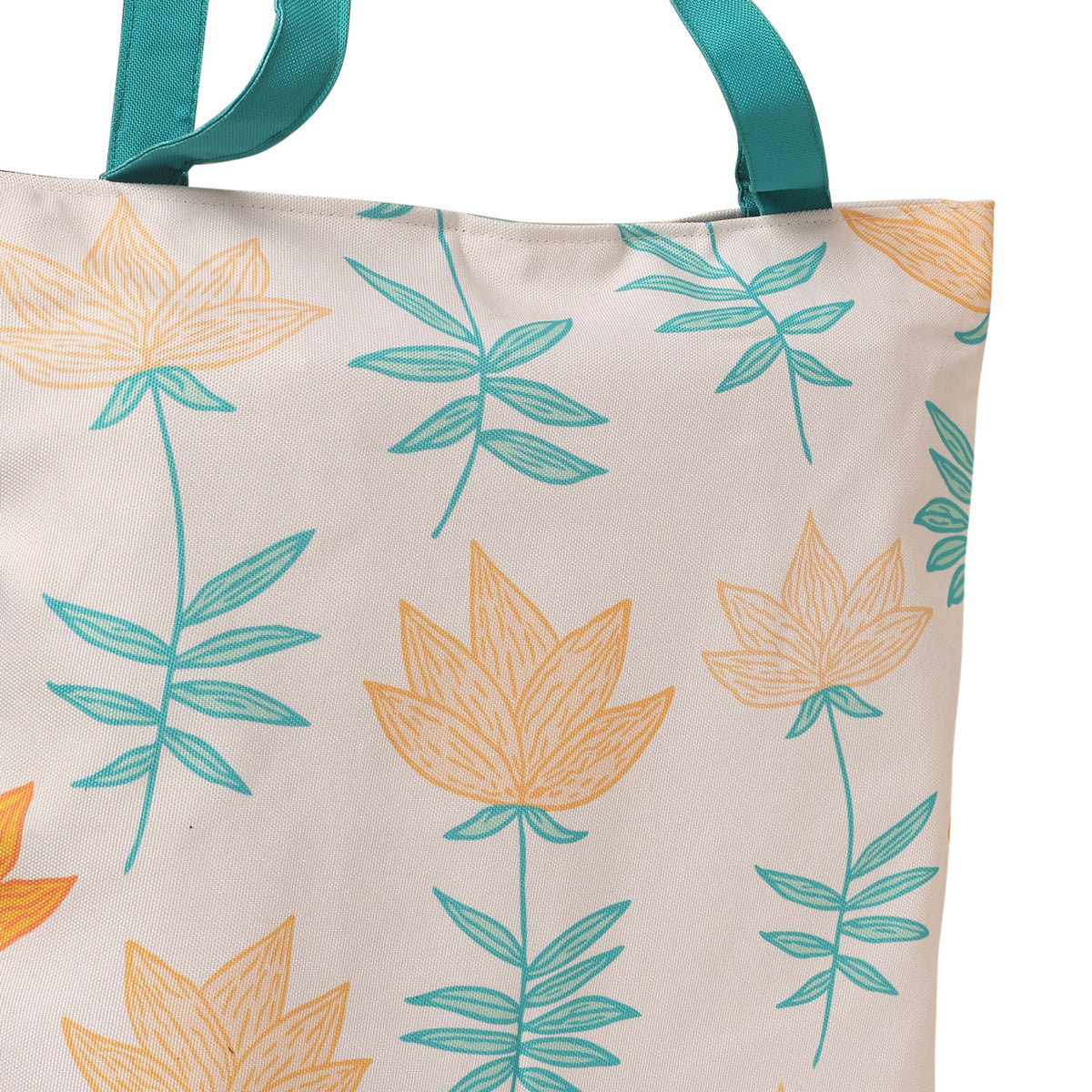 Fashionable tote bag with eye-catching orange and green leaf design, a trendy addition to your wardrobe.