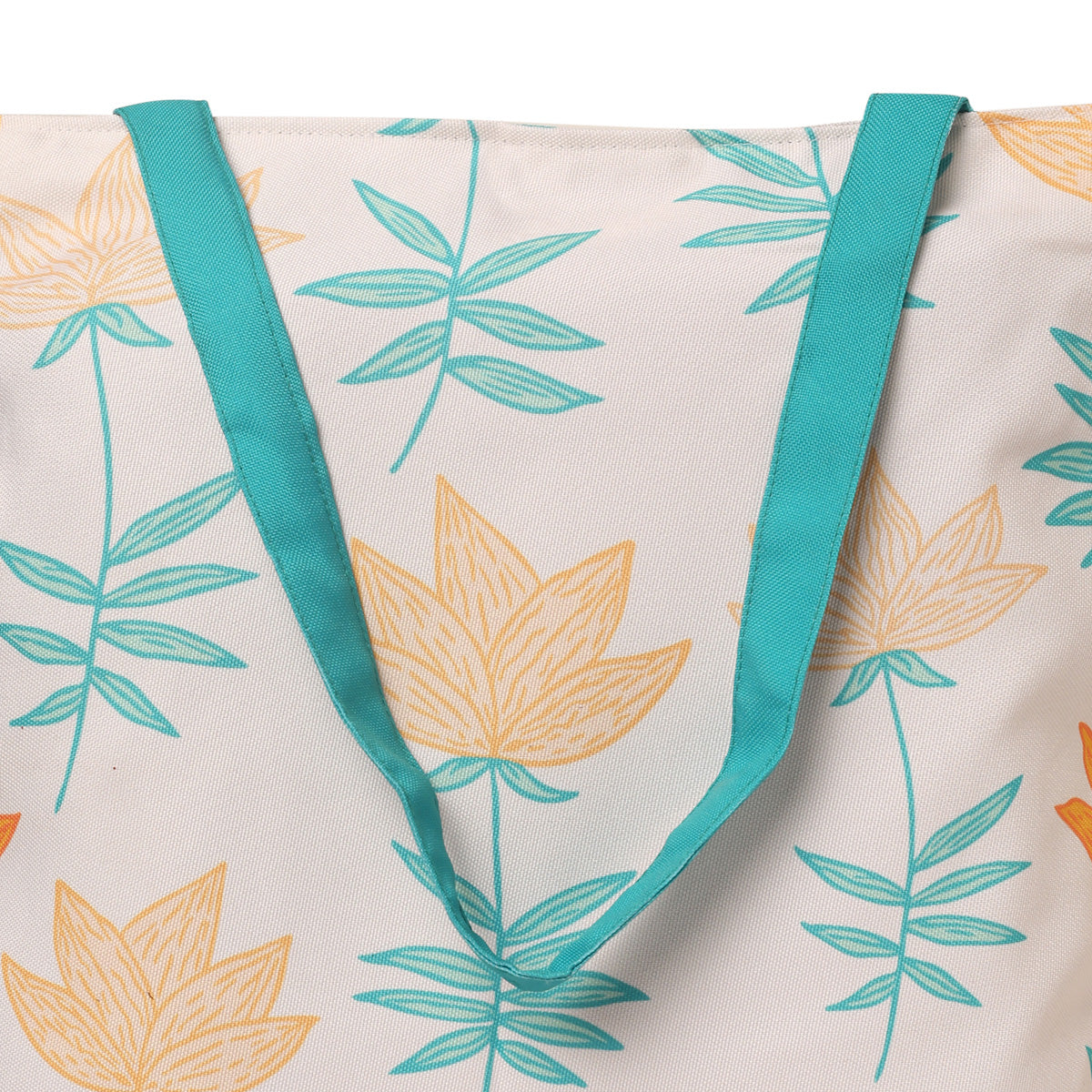 A tote bag featuring vibrant orange and green leaves design.