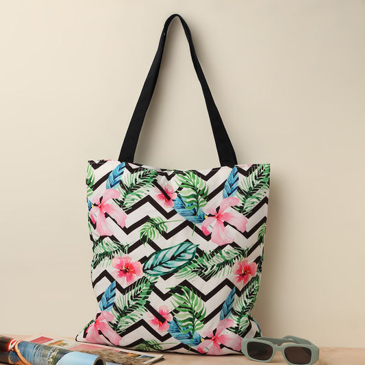 Colorful tote bag with tropical print, perfect for beach days or shopping trips.