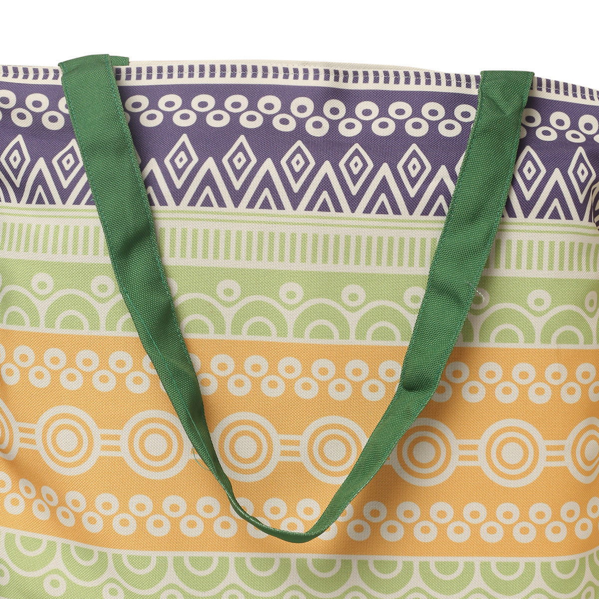 Tote bag with bright colors and a green handle.