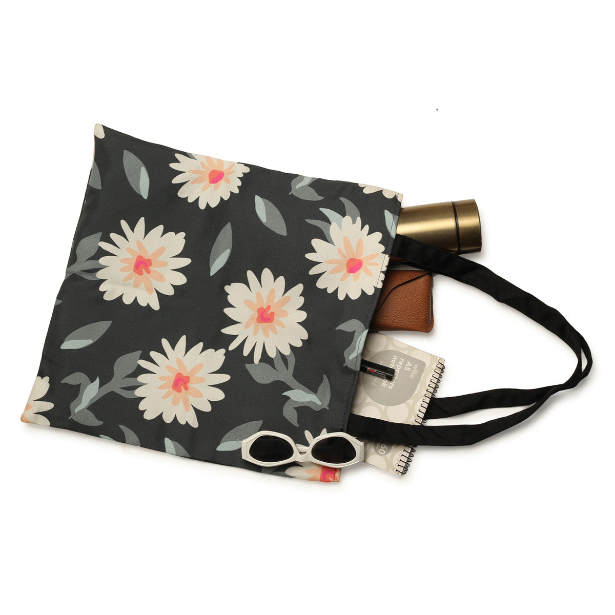 Fashionable tote bag with a beautiful flower pattern, great for adding a touch of nature to your look.