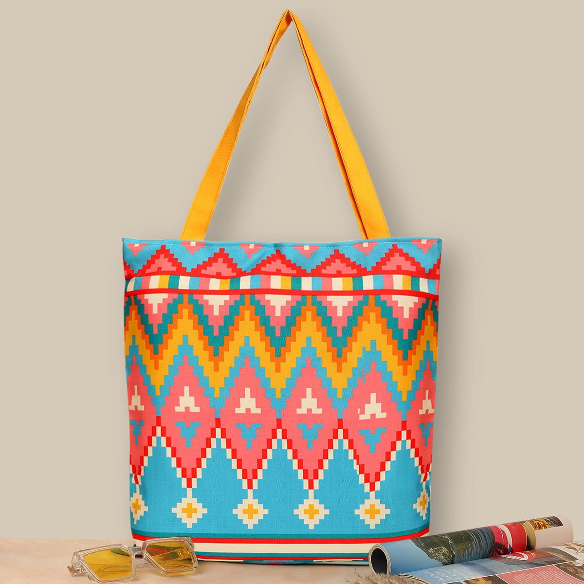 A vibrant tote bag filled with stylish sunglasses, perfect for a sunny day out at the beach or park.