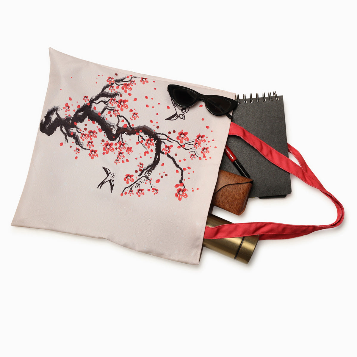  Elegant tote bag adorned with a beautiful cherry blossom pattern, ideal for carrying essentials with a touch of nature.