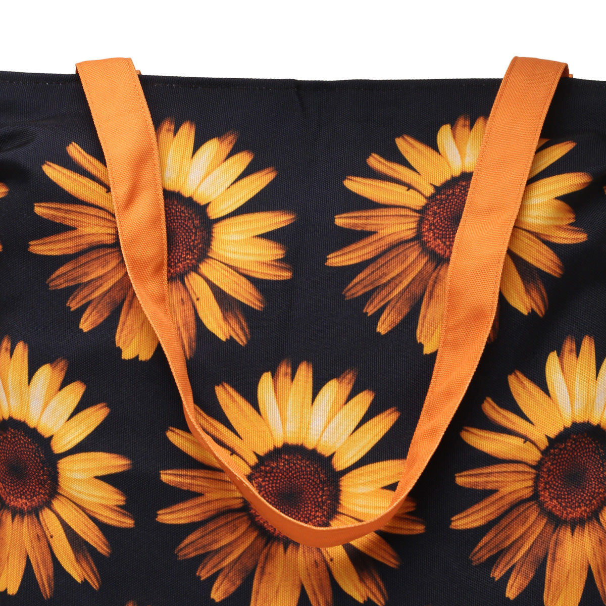 Trendy tote bag with sunflowers on a black and orange background.