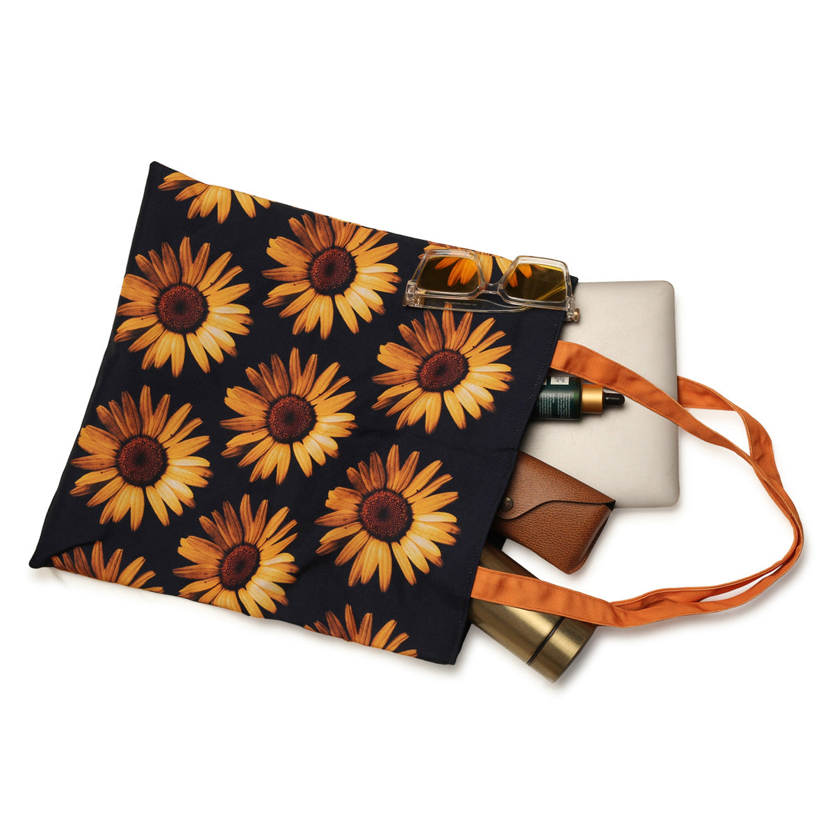 A chic black and orange tote bag featuring bright sunflowers, ideal for adding a pop of color to any ensemble.