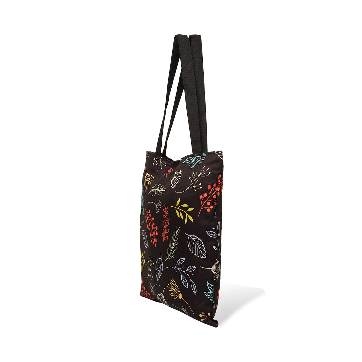 Vibrant leaves and flowers decorate a black tote bag.