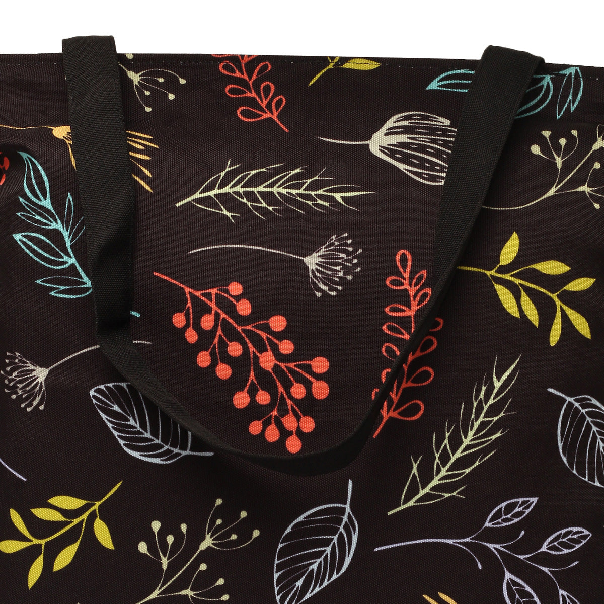 A black tote bag with colorful leaves and berries.