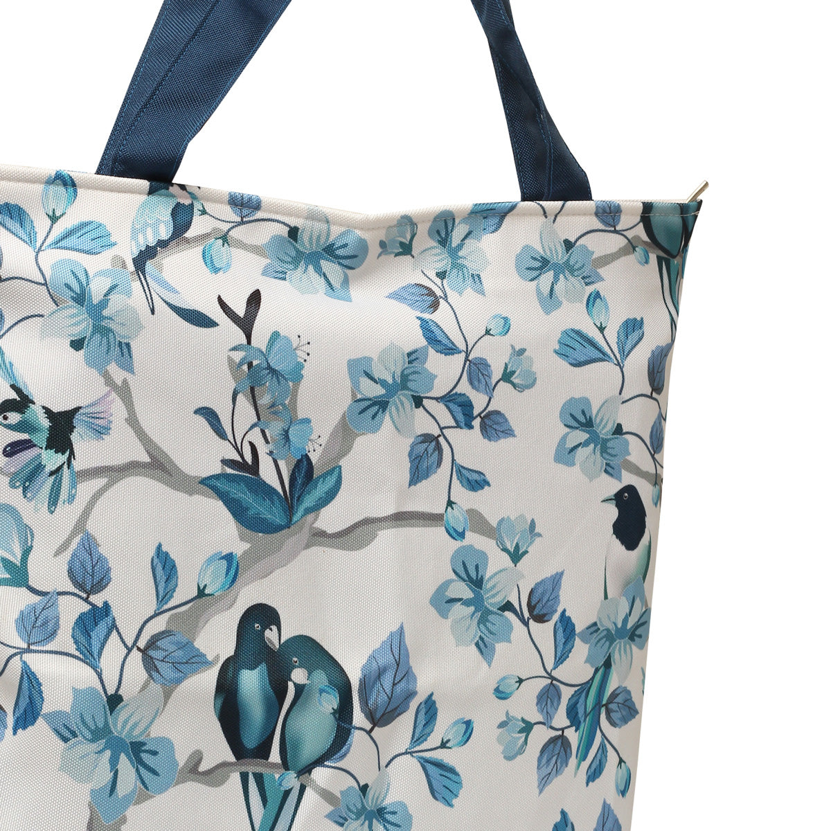 Blue and white tote bag with bird pattern