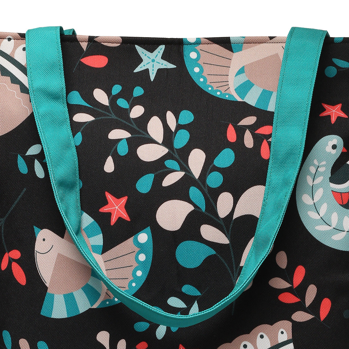  A stylish black and turquoise tote bag featuring a design of birds and leaves, perfect for everyday use