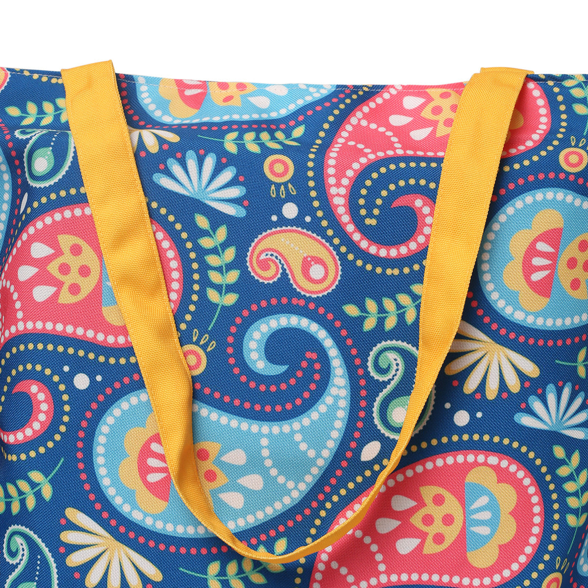 Fashionable tote bag adorned with a vibrant paisley print and yellow handles, a trendy accessory for any outfit