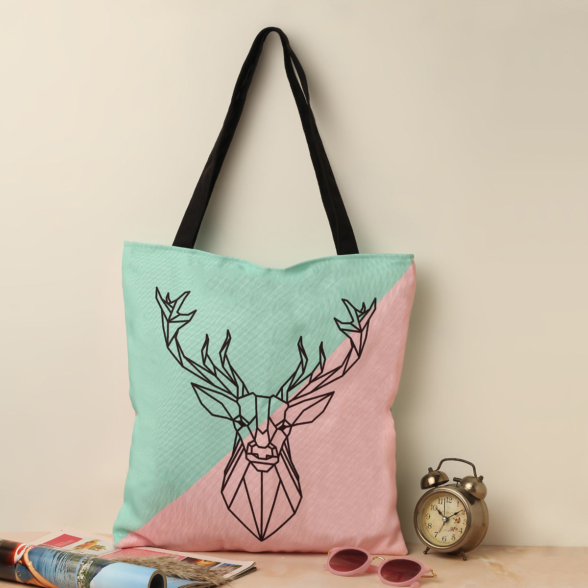 A stylish tote bag featuring a detailed deer design, perfect for nature enthusiasts and everyday use.