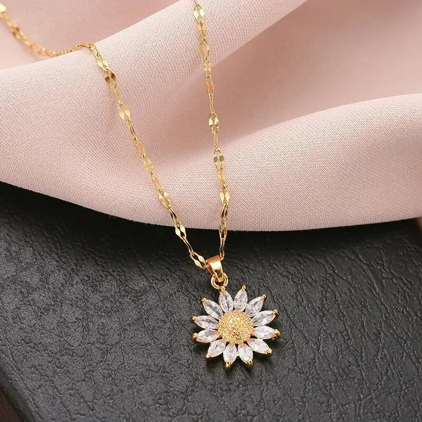  Gold necklace adorned with a lovely sunflower pendant, a chic accessory